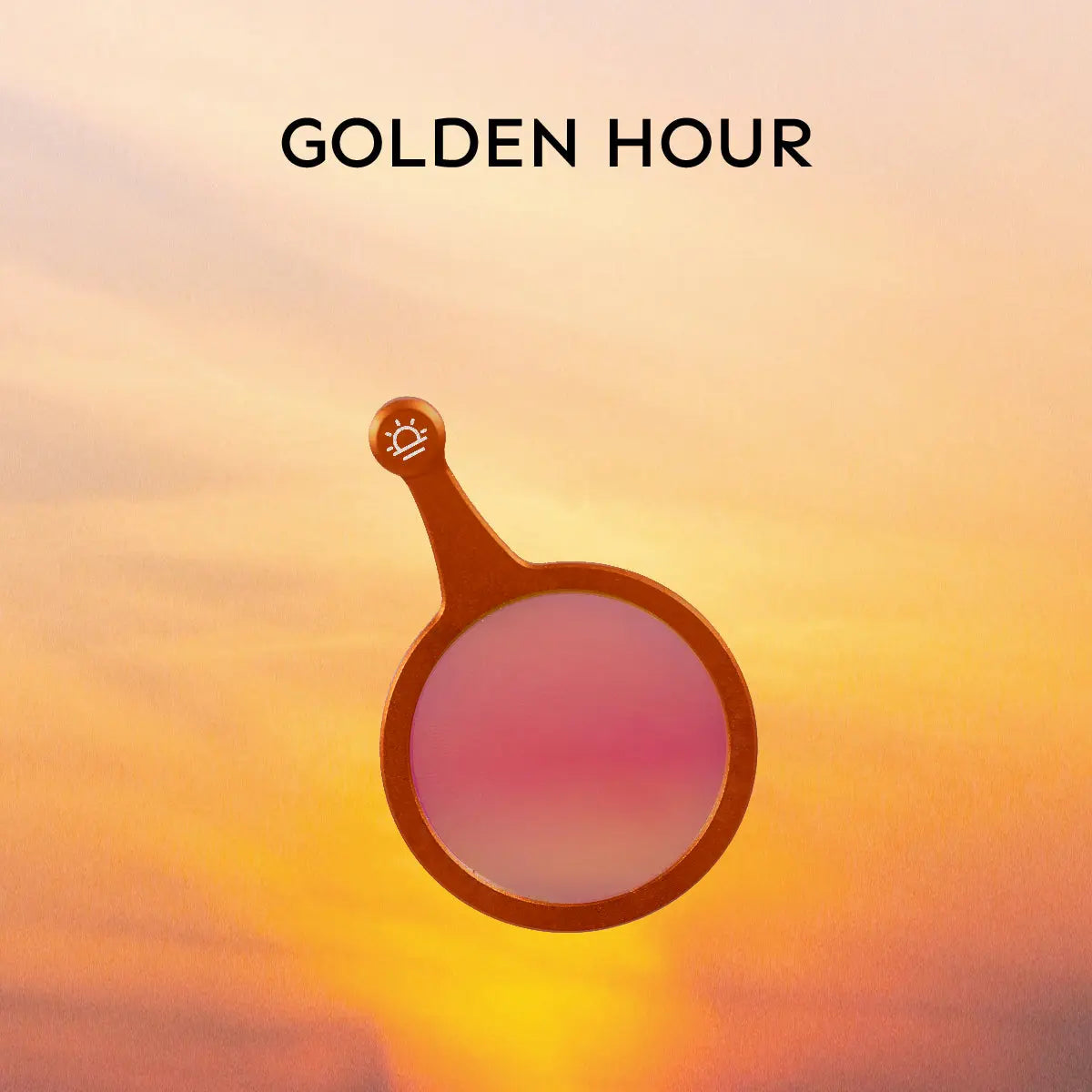 Hobolite Iris Golden Hour gel filter with pink to orange gradient lens and orange handle on sunset background.
