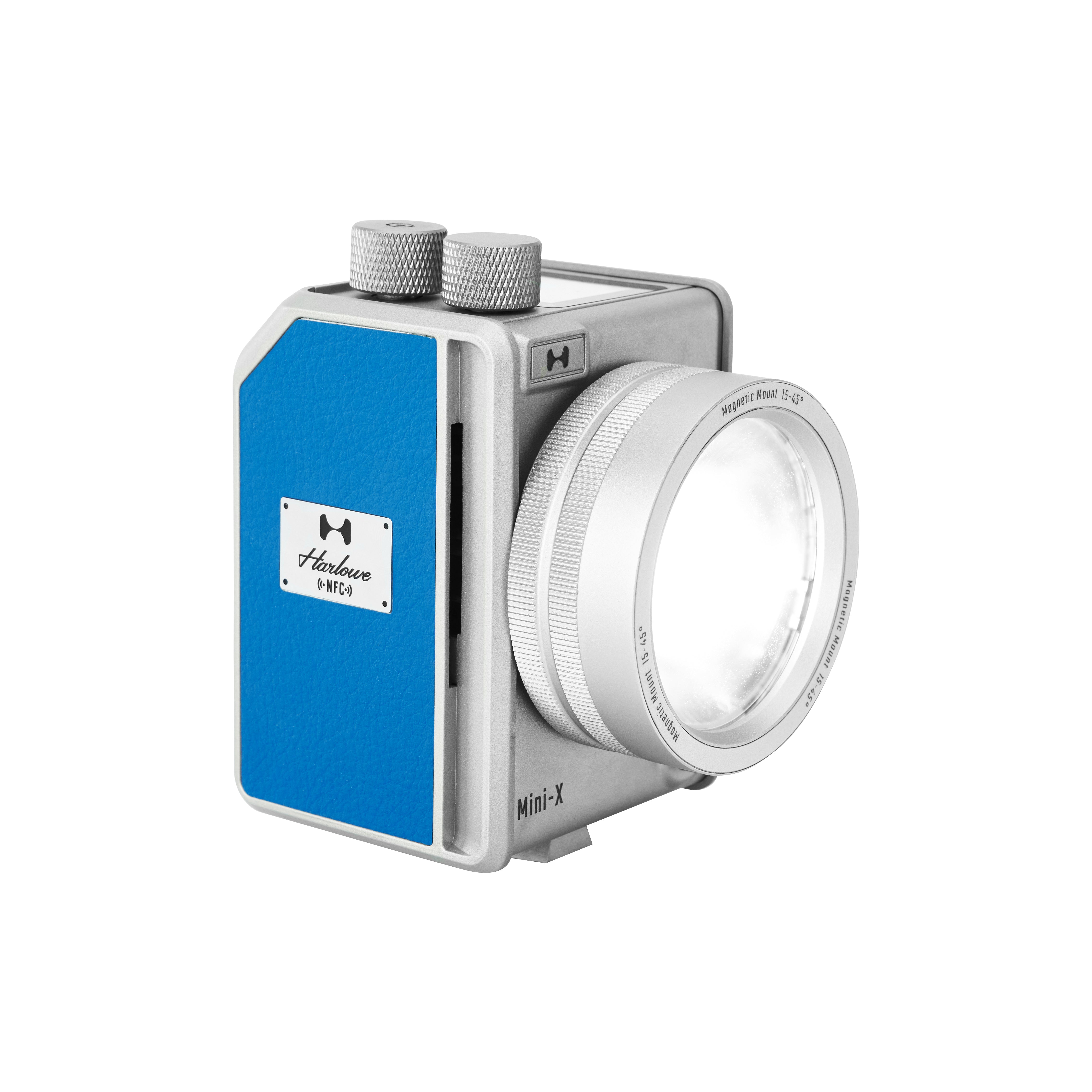 Harlowe Mini II-X 20W Creator Kit front lens illuminated on white background.