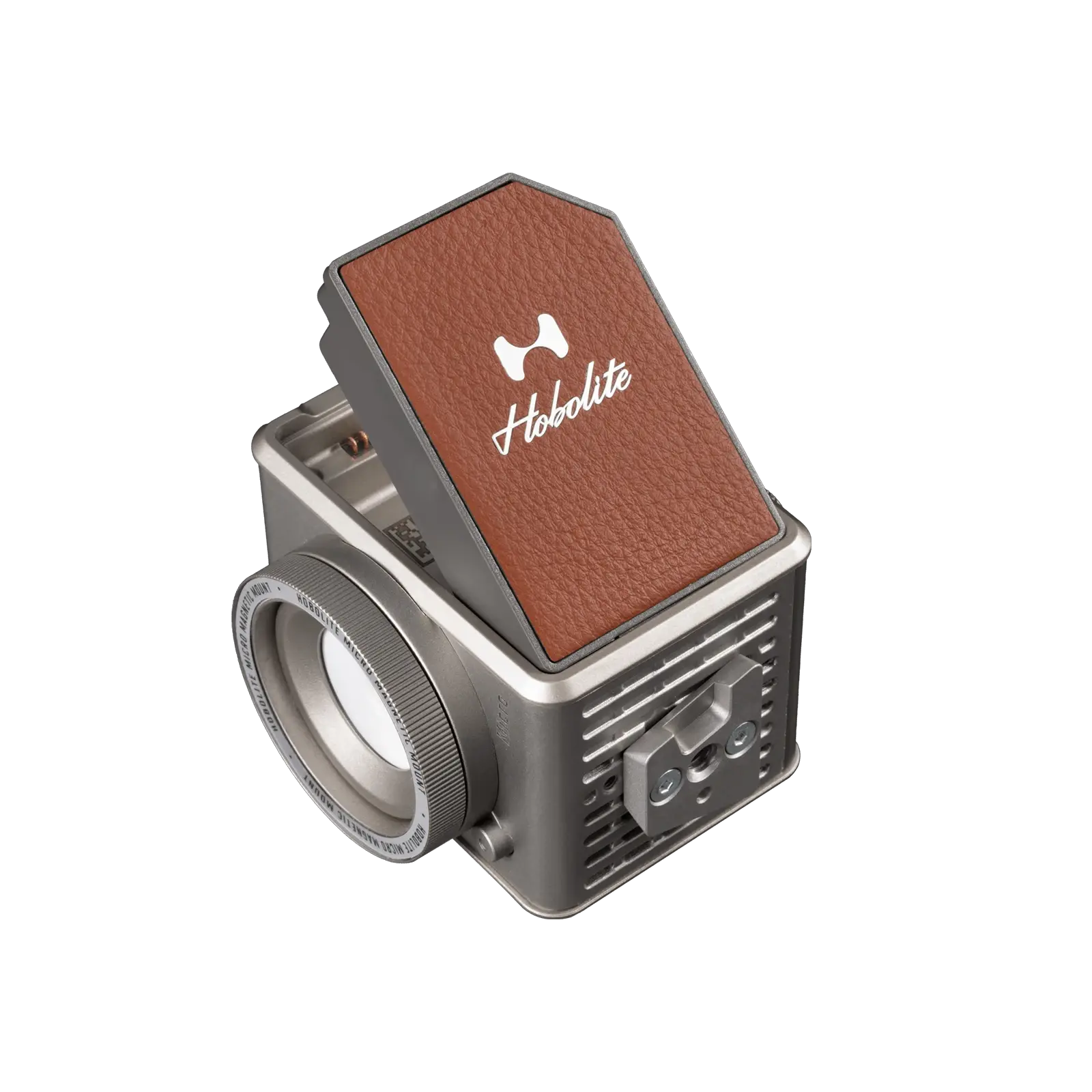 Compact Hobolite Micro portable LED light with silver metal body and brown leather panel on black background.