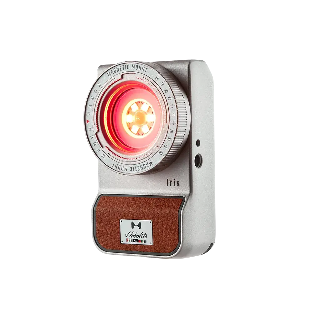 Harlowe Iris 5W Spectra RGBCW LED light, silver with red illumination and brown panel, magnetic mount for content creation.