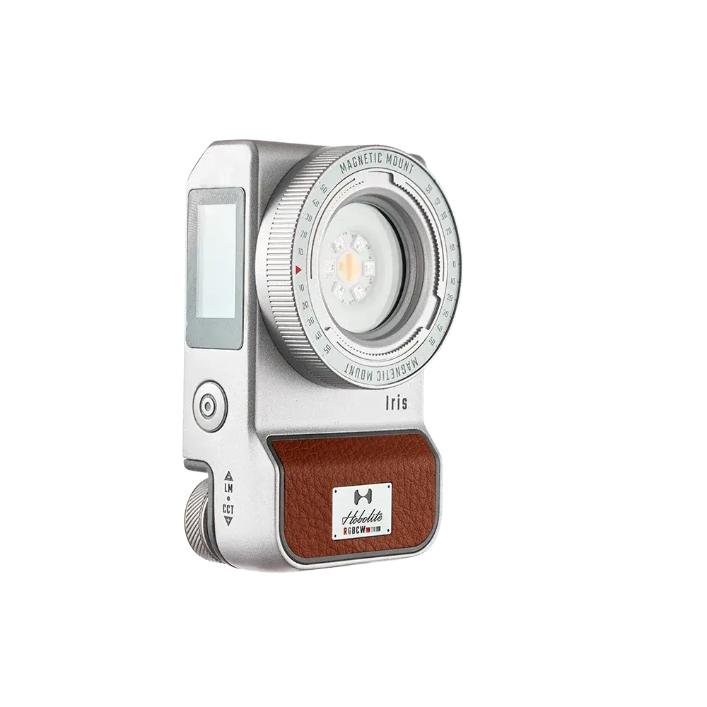 Silver Harlowe Iris 5W Spectra RGBCW LED light, brown panel, digital display, magnetic mount. Content creation lighting.