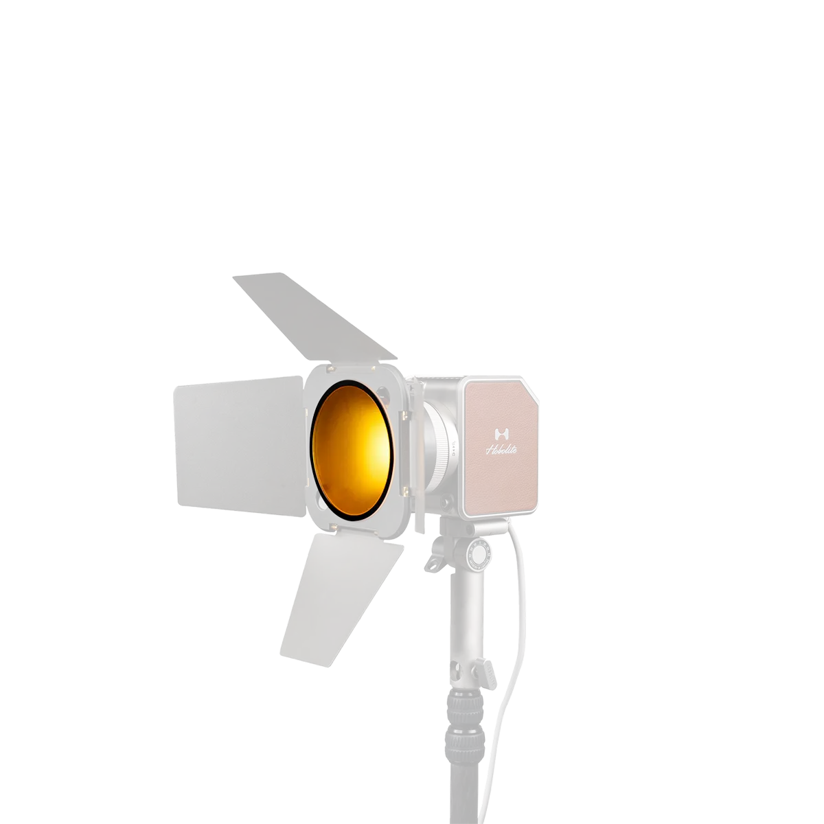 Hobolite Avant professional lighting fixture with amber color gel and barn doors on a stand.