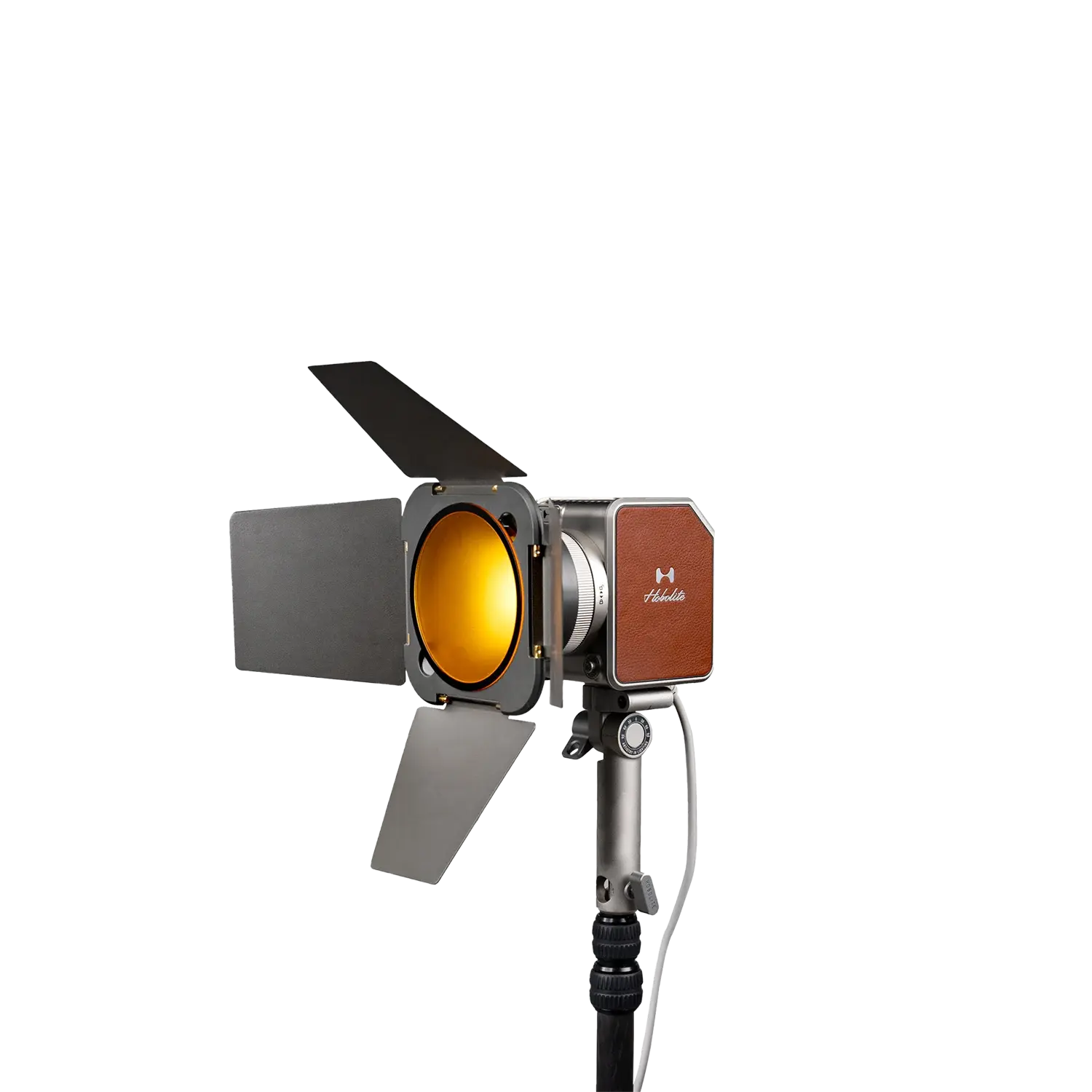 Hobolite Avant LED light with orange color gel, barn doors, and professional tripod mount.