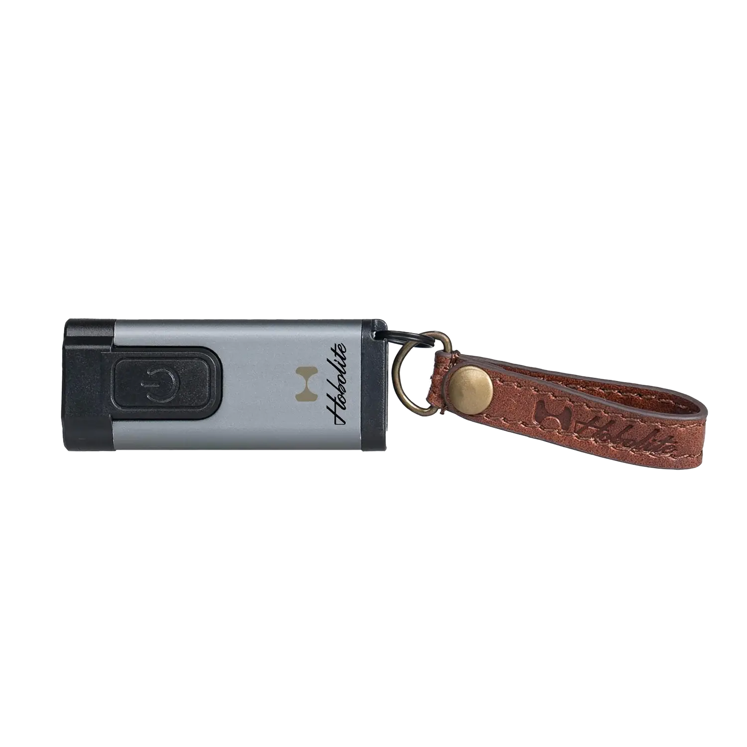 Hobolite compact keychain light, silver body, black button, brown leather fob on brass ring.