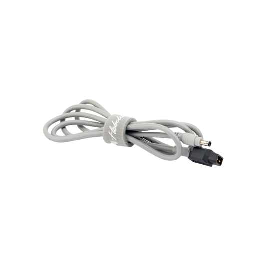 Hobolite Avant 1.5m D-tap cable with two connectors, coiled and secured with velcro strap.