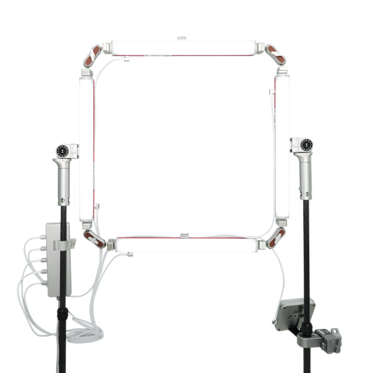 Front view of the Mark Mann Signature Kit square light frame rigged between two carbon-fiber stands with cabled power hub
