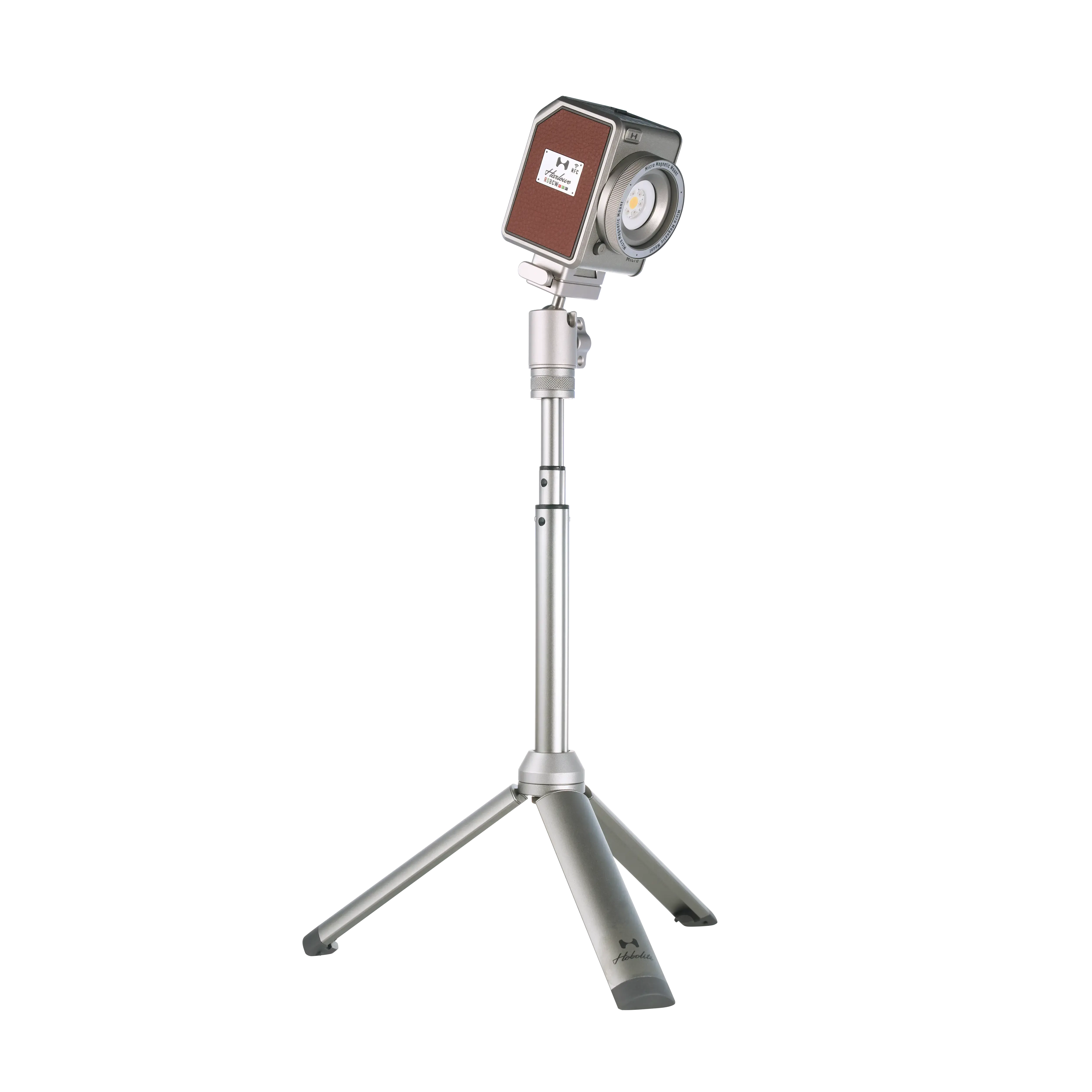 Compact Harlowe Micro 8W Spectra RGBCW LED light with adjustable silver tripod for versatile content creation.