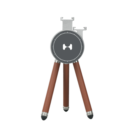 Harlowe Tabletop Tripod for MagSafe: charcoal head, brown leather legs, silver accents. Ideal for mobile photography.