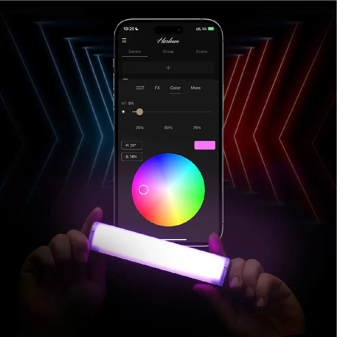 Harlowe Blade 5 tube light held in hand, controlled by smartphone app showing color wheel and RGB options.