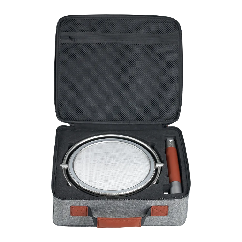 Harlowe Sol 40W LED panel light and accessories in grey carrying case with brown leather handles.