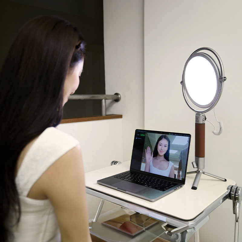 Harlowe Sol 40W round LED panel light enhancing video call lighting for professional content creators.
