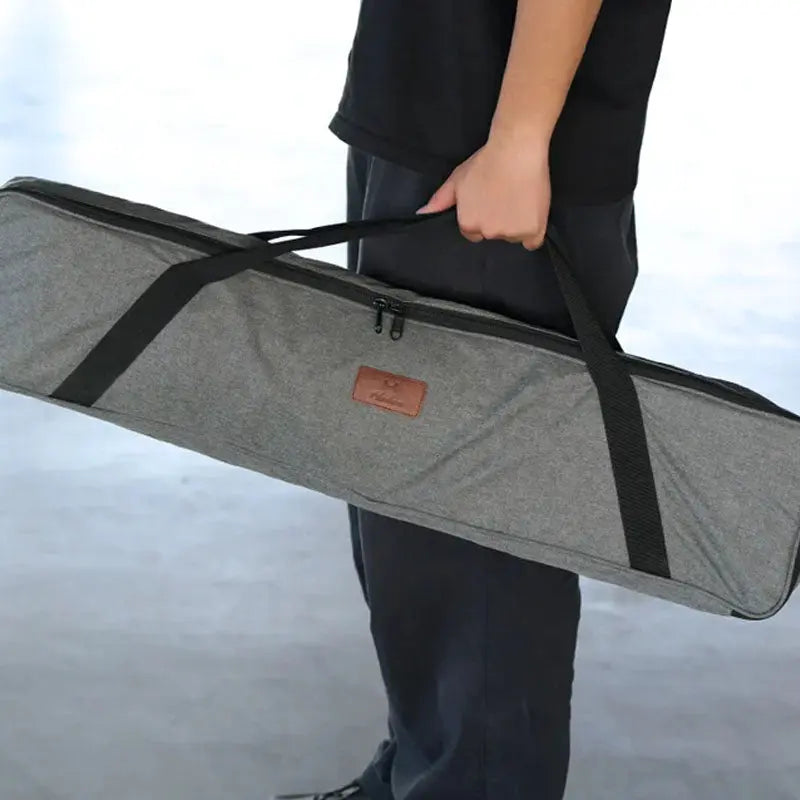 Harlowe deep softbox lighting 30in carrying case with black straps and brand patch, portability focus.