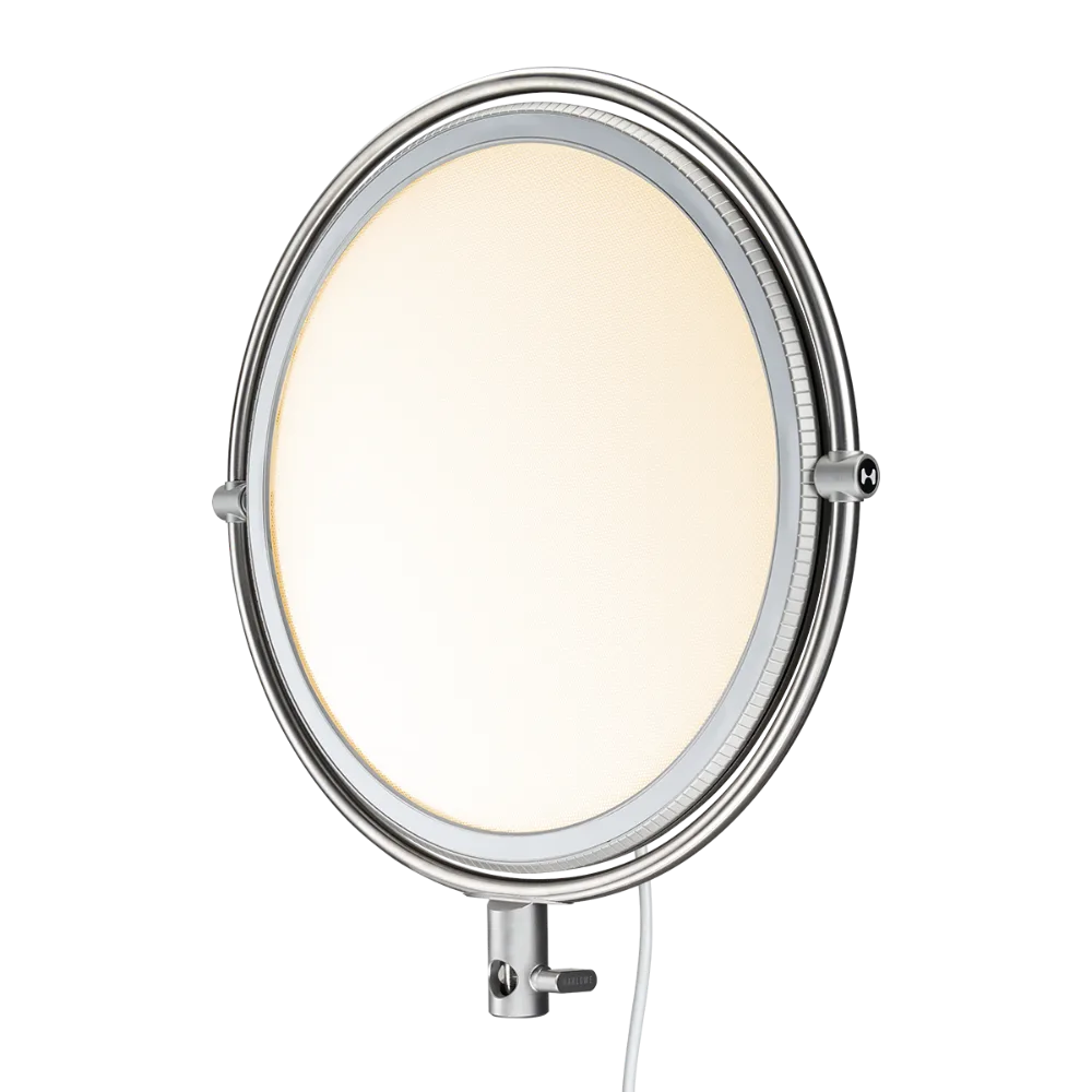 Harlowe Sol 100W round LED panel light, silver frame, illuminated with warm white light, product detail.