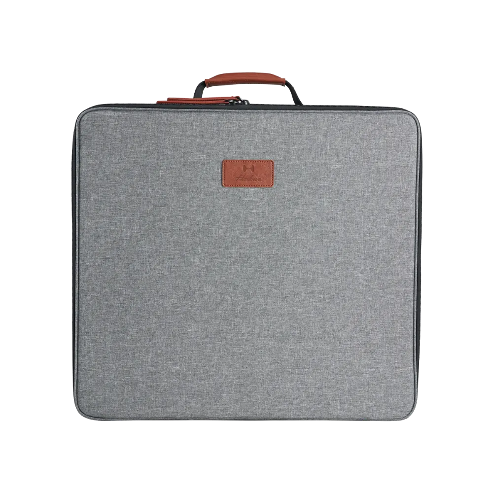 Harlowe Sol 100W LED panel light gray carrying case with leather handle and logo patch.